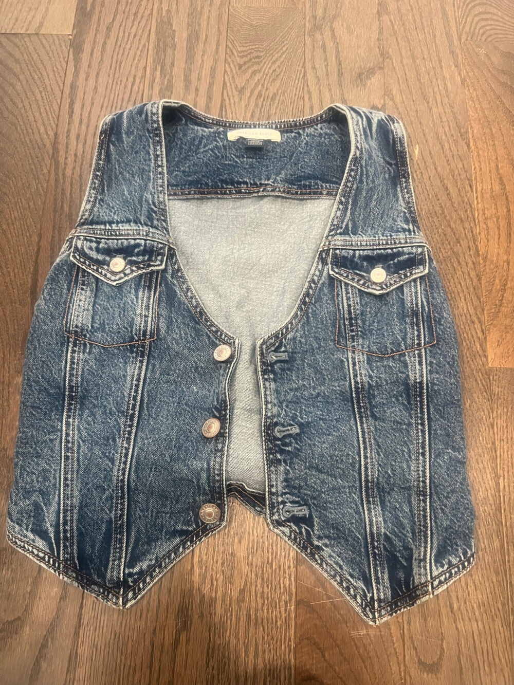 American Eagle Outfitters blue denim jacket with copper stitching